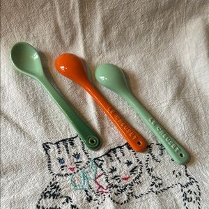 Le Creuset Ceramic Spoons — flame and rosemary